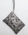 Stains silver clutch bag